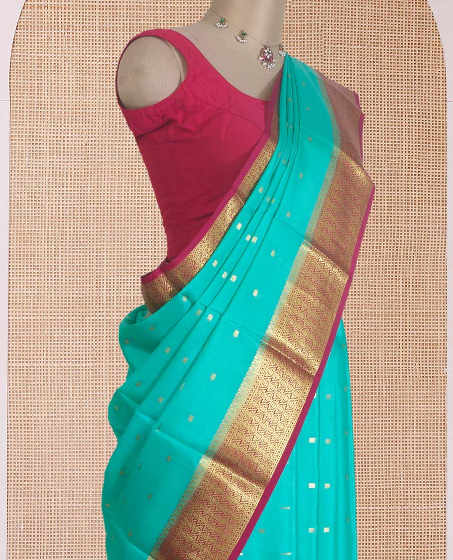 Green zari buttas Mysore silk saree, contrast floral design border, and pallu of jaal design