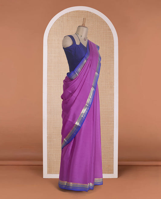 Rani pink plain Mysore silk saree, contrast traditional zari border, and zari striped pallu