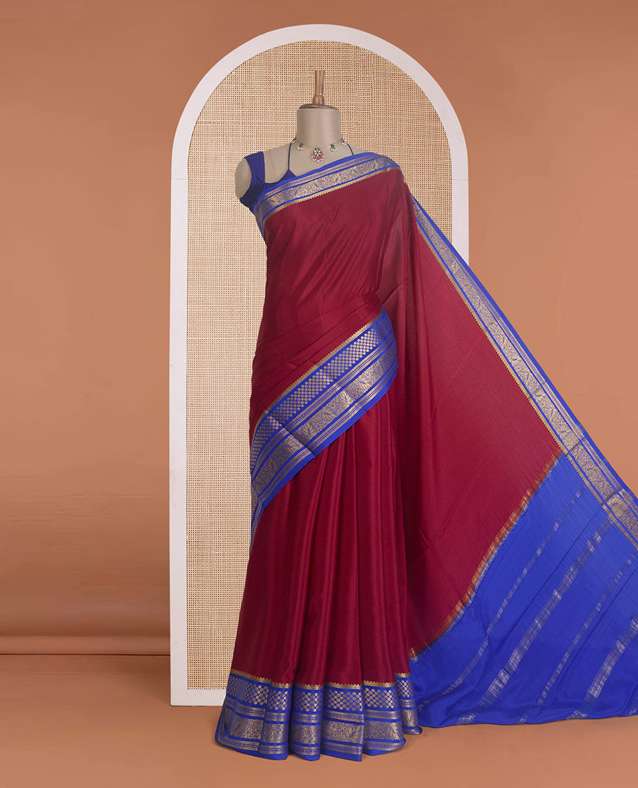 Maroon plain Mysore silk saree, contrast traditional zari designs steeped border, and zari striped pallu