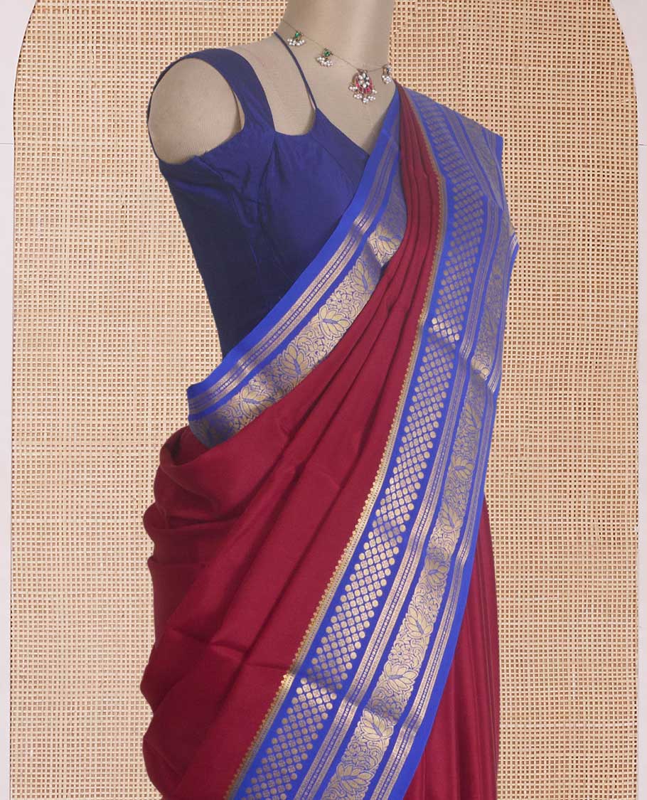 Maroon plain Mysore silk saree, contrast traditional zari designs steeped border, and zari striped pallu