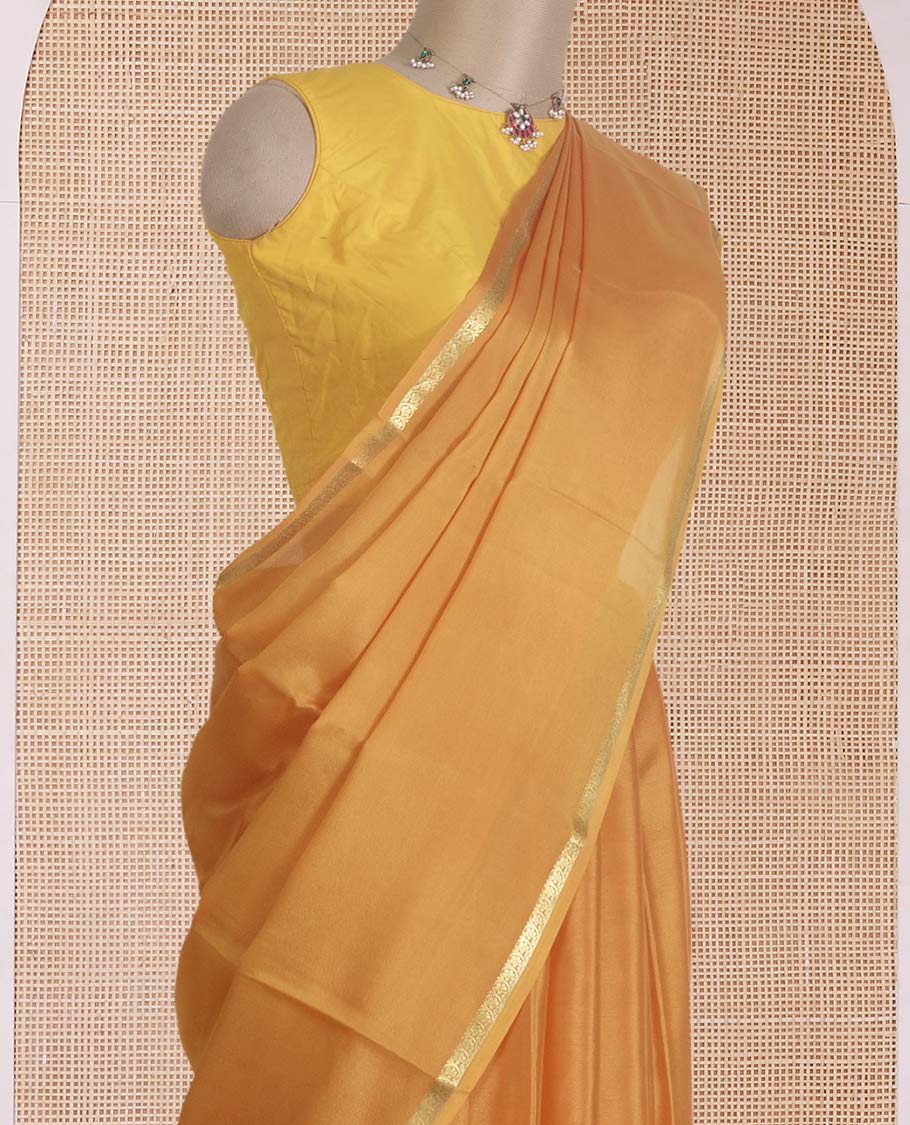 Mustard plain Mysore silk saree, traditional zari border, and zari striped pallu