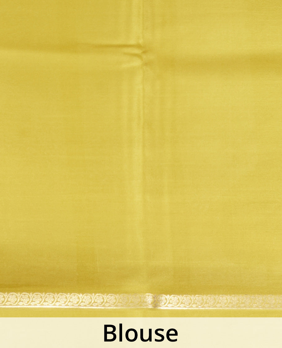 Yellow plain Mysore silk saree, traditional zari border, and zari striped pallu