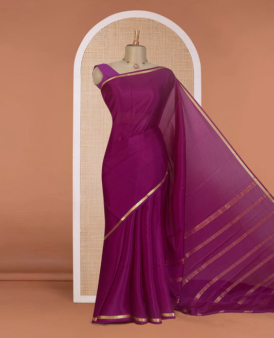 Purple plain Mysore silk saree, floral creeper zari border, and zari striped pallu