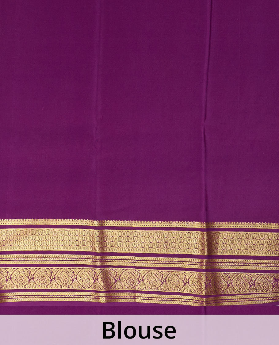 Green plain Mysore silk saree, contrast traditional zari border of paisleys, and zari striped pallu