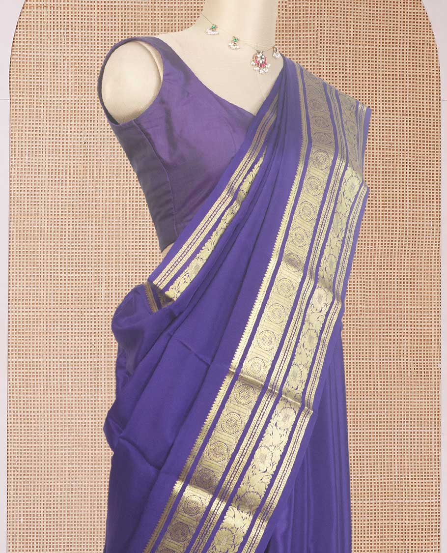 Navy blue plain Mysore silk saree, traditional zari design steeped border, and zari striped pallu