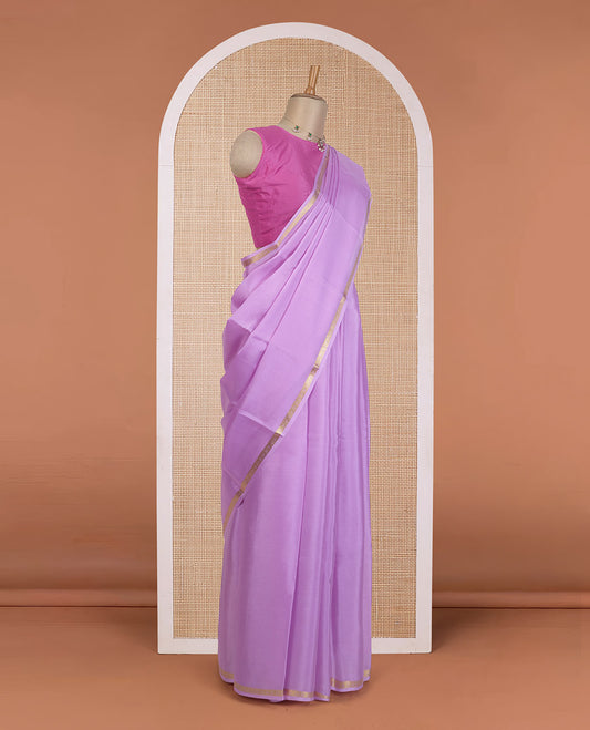 Violet plain Mysore silk saree, floral creeper zari border, and zari striped pallu