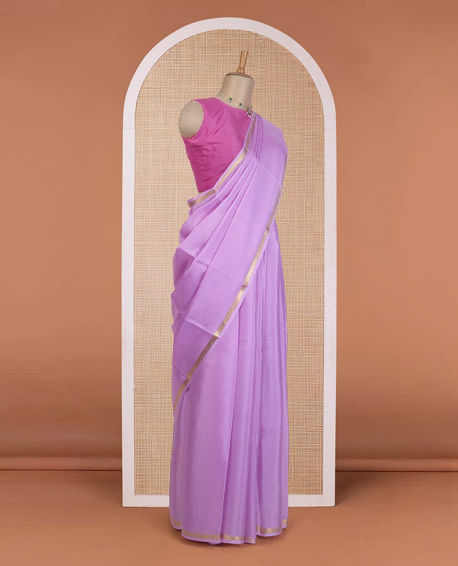 Violet plain Mysore silk saree, floral creeper zari border, and zari striped pallu
