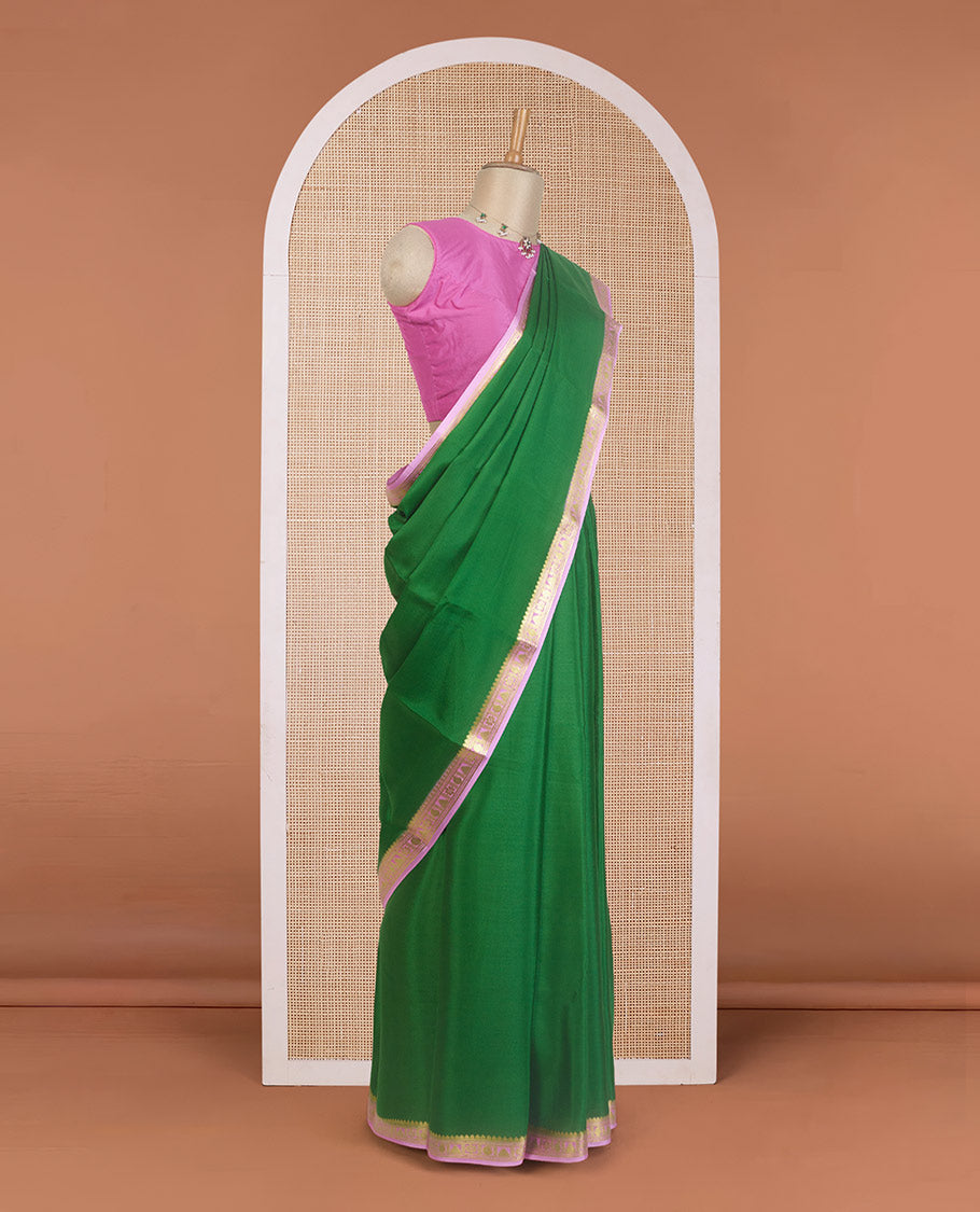Green plain Mysore silk saree, contrast traditional zari design border, and zari striped pallu