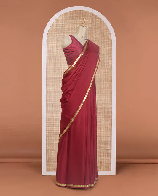 Maroon plain Mysore silk saree, paisley zari design border, and zari striped pallu