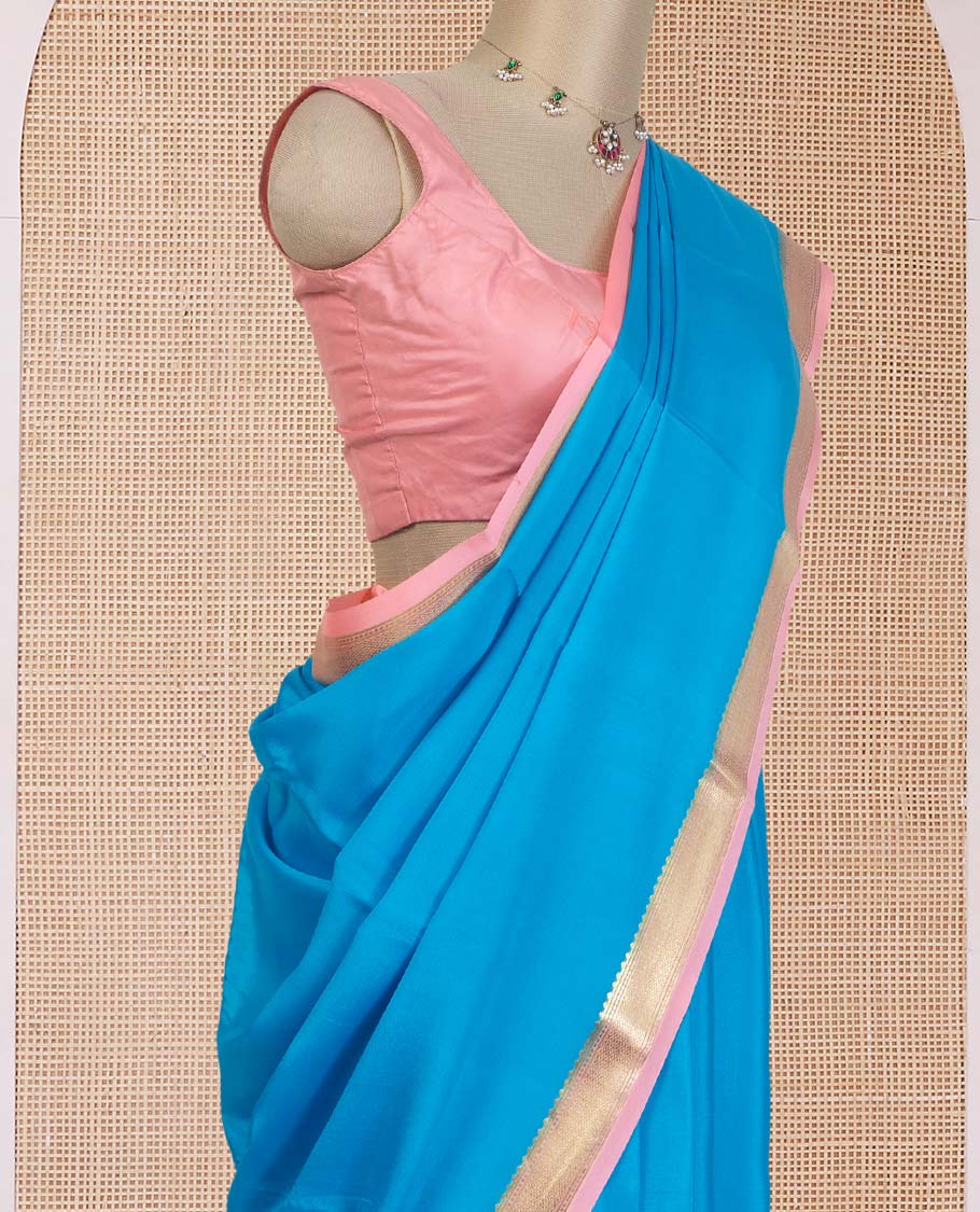 Aszure blue plain Mysore silk saree, contrast traditional zari border, and zari striped pallu