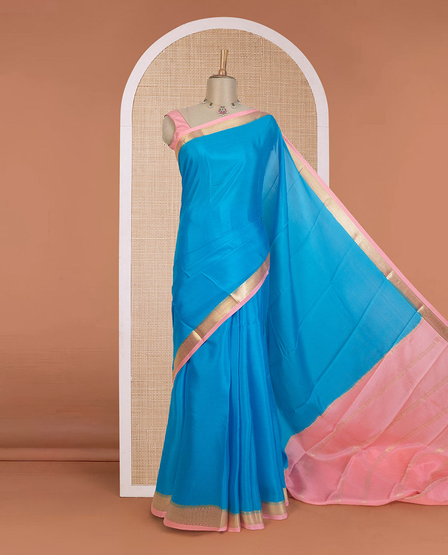 Aszure blue plain Mysore silk saree, contrast traditional zari border, and zari striped pallu