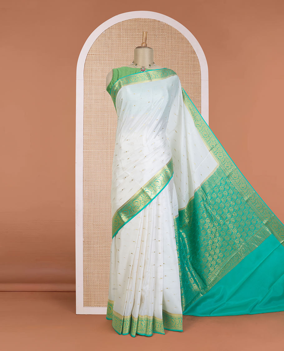 Cream zari buttas Mysore silk saree, contrast floral creeper zari border, and floral jaal pallu