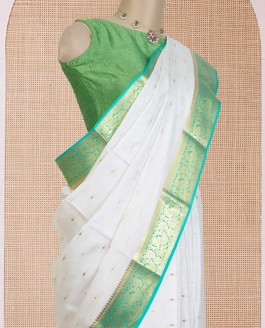 Cream zari buttas Mysore silk saree, contrast floral creeper zari border, and floral jaal pallu