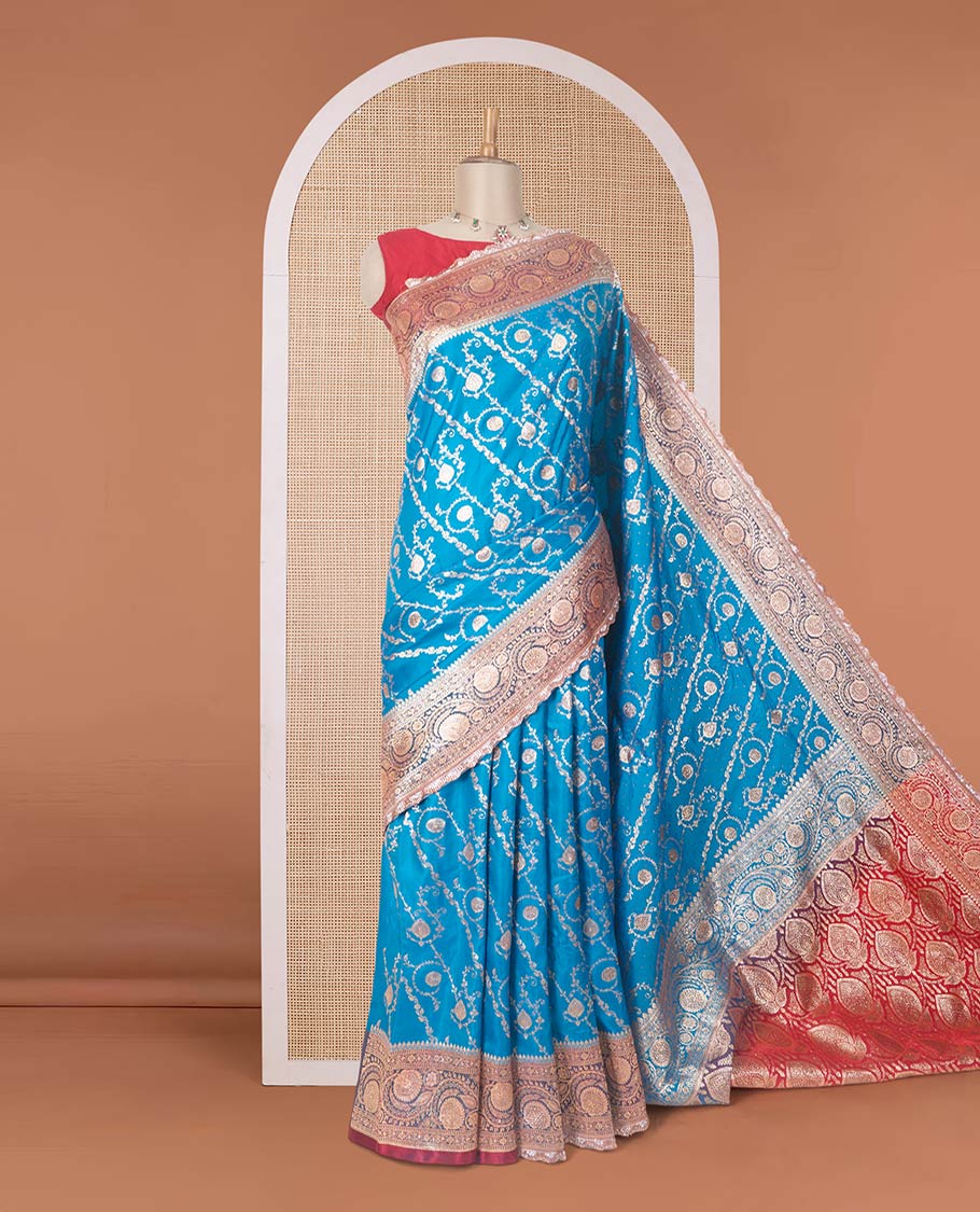 Blue jacquard with micro stonework banaras nylon silk saree, contrast floral creeper zari and stonework border, and intricately zari woven pallu