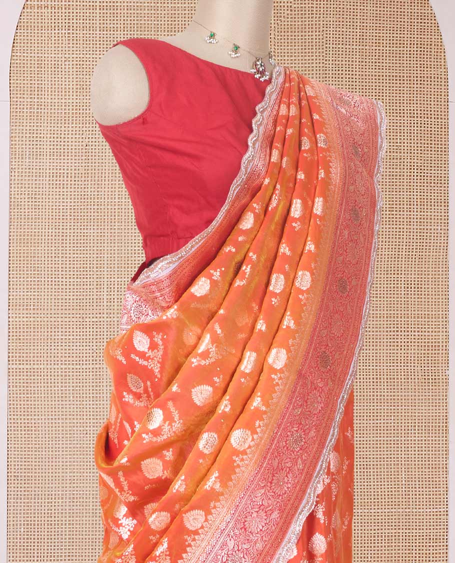 Orange zari buttas with micro stonework banaras nylon silk saree, contrast traditional zari and stonework border, and zari woven pallu with stone work
