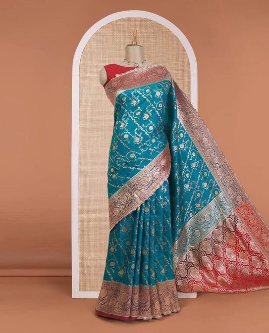 Persian green jacquard with micro stonework banaras nylon silk saree, contrast floral creeper zari and stone work border, and intricately zari woven pallu