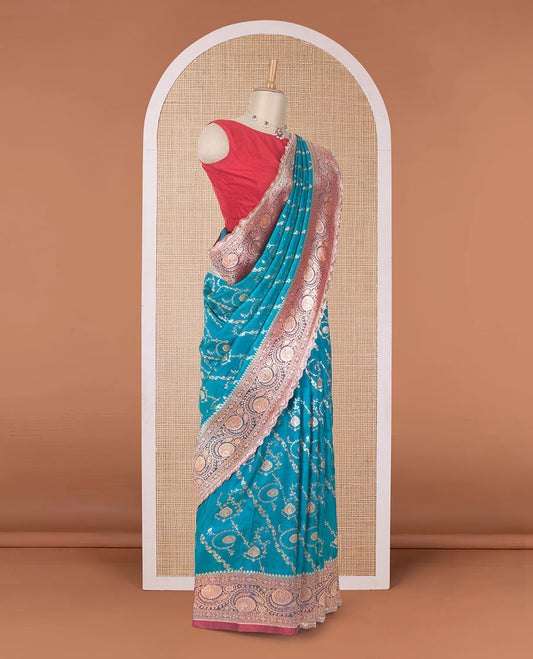 Persian green jacquard with micro stonework banaras nylon silk saree, contrast floral creeper zari and stone work border, and intricately zari woven pallu