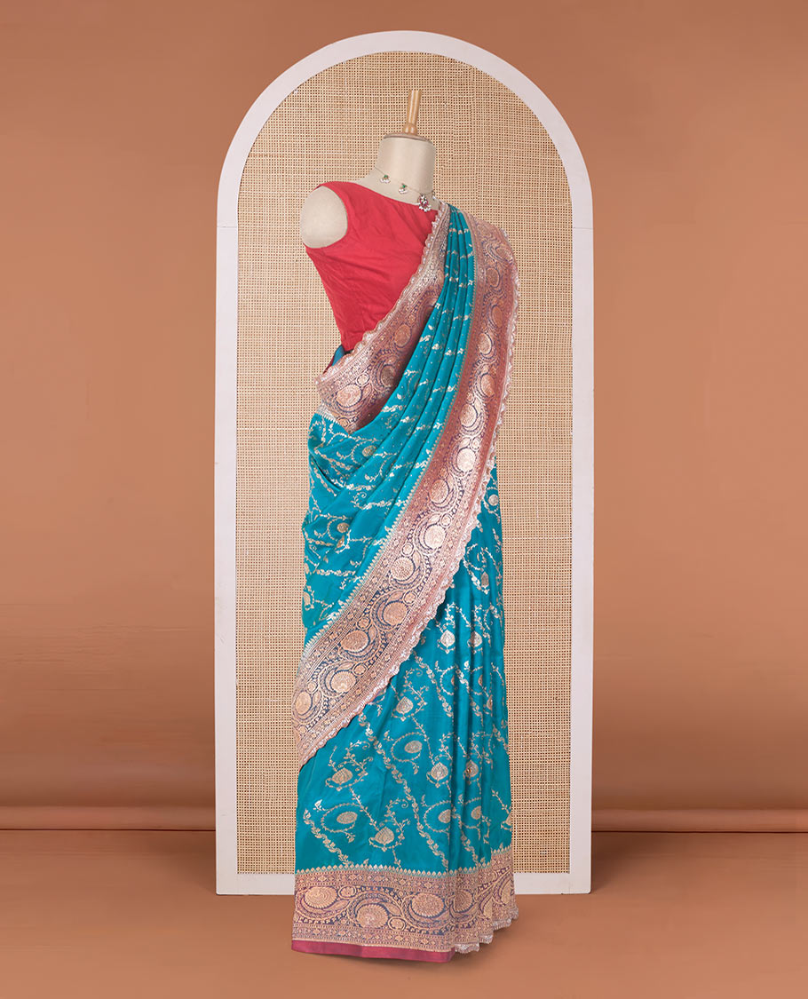 Persian green jacquard with micro stonework banaras nylon silk saree, contrast floral creeper zari and stone work border, and intricately zari woven pallu