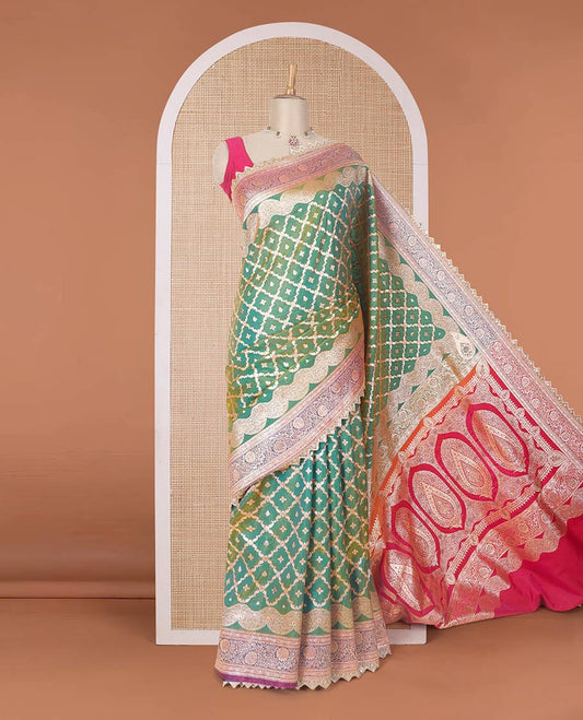 Green jaal jacquard with micro stonework banaras nylon silk saree, contrast floral creeper zari and stone work border, and intricately zari woven pallu