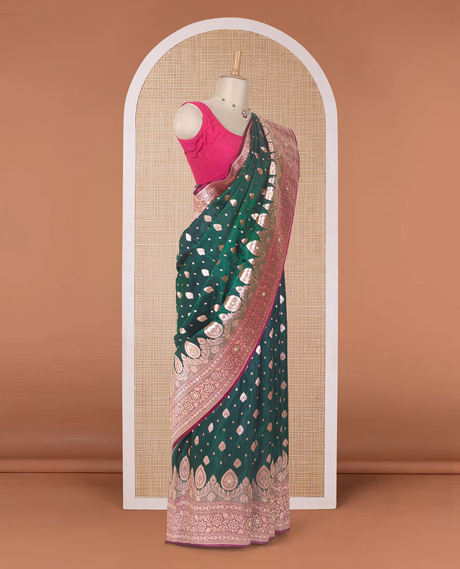 Dark green zari buttas with micro stonework banaras nylon silk saree, contrast floral creeper zari and stone work border, and zari woven jaal pallu