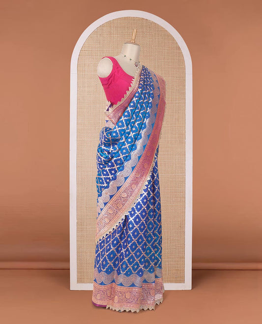 Royal blue jaal jacquard with micro stone work banaras nylon silk saree, contrast floral creeper zari and stone work border, and intricately zari woven pallu