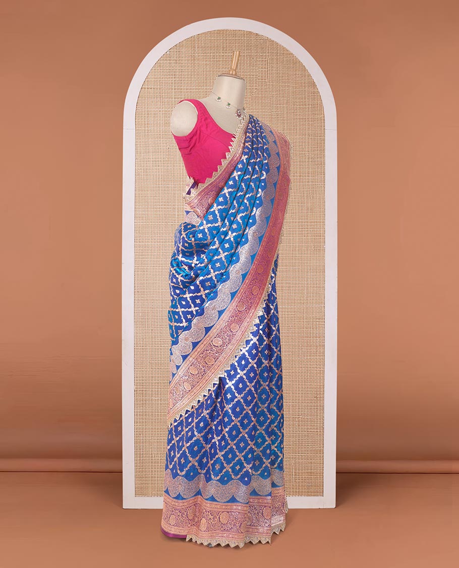 Royal blue jaal jacquard with micro stone work banaras nylon silk saree, contrast floral creeper zari and stone work border, and intricately zari woven pallu