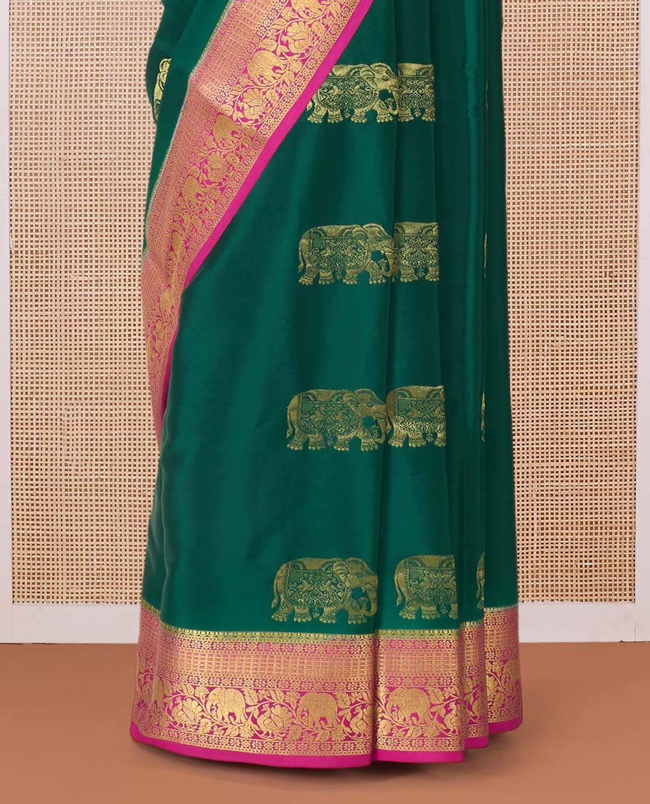 Green elephant motifs zari woven Mysore silk saree, contrast traditional zari border, and pallu of buttas and thick zari checks