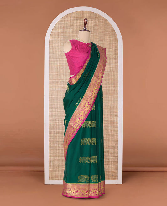 Green elephant motifs zari woven Mysore silk saree, contrast traditional zari border, and pallu of buttas and thick zari checks