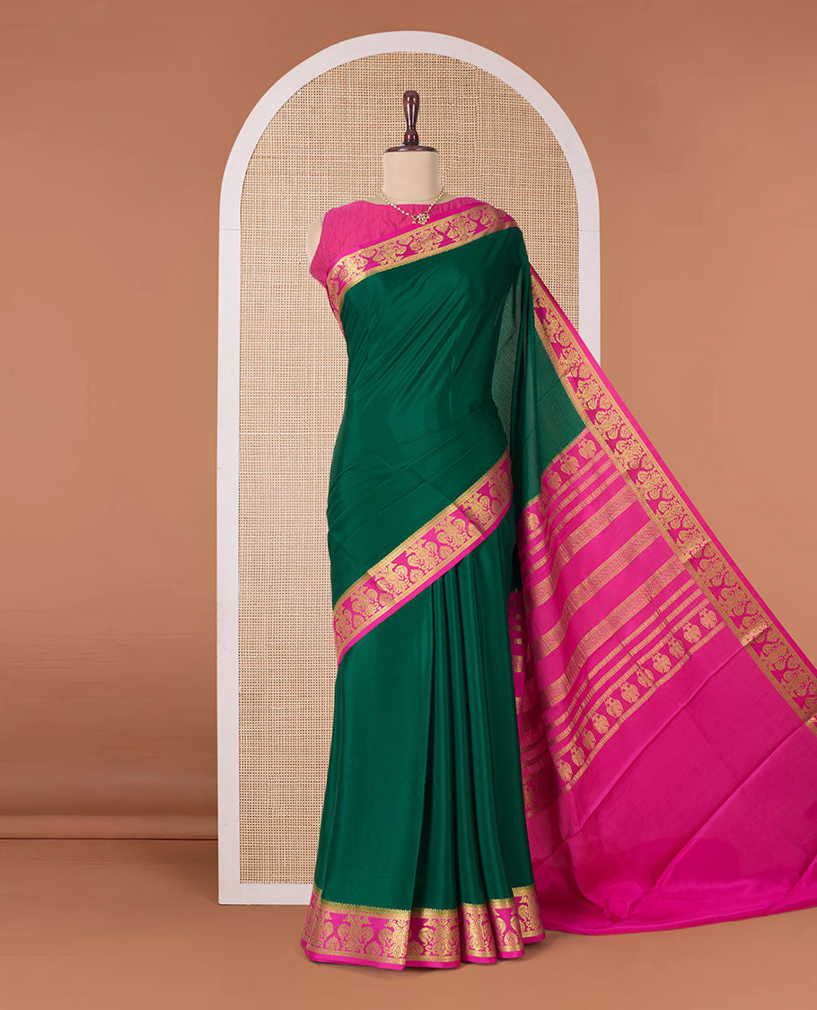 Green plain Mysore silk saree, contrast two-headed eagle border, and pallu of traditional designs
