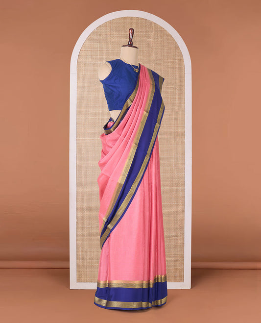 Peach zari checked Mysore silk saree, contrast rettai pettu peacock eye zari border, and pallu of zari stripes