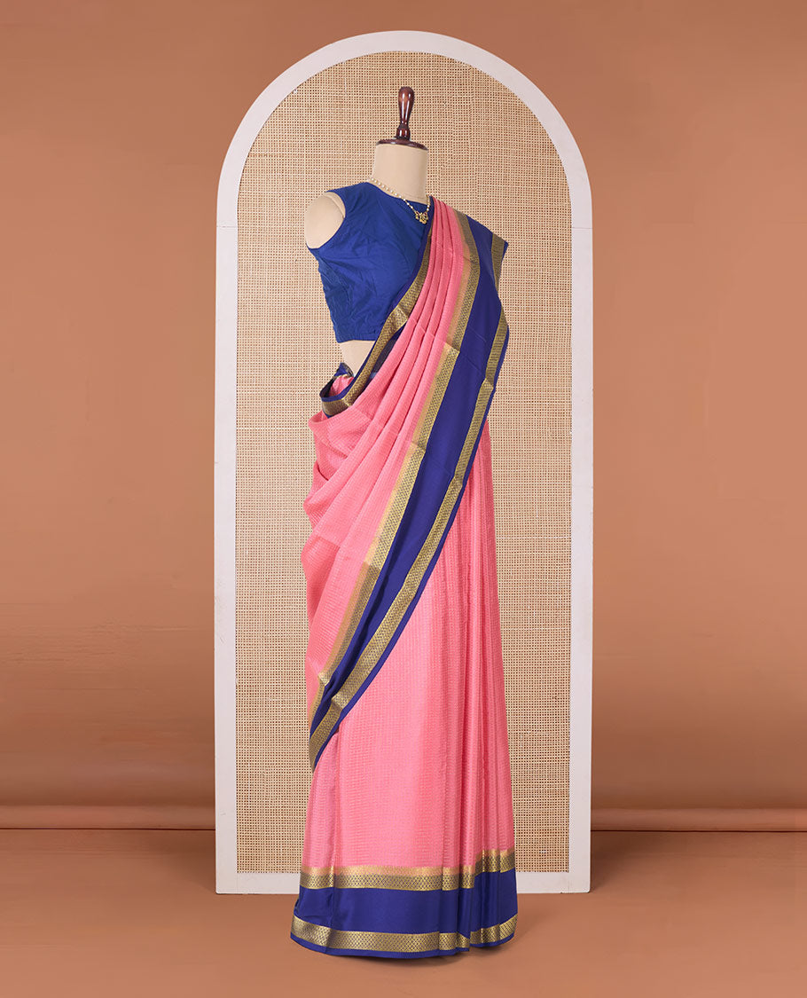 Peach zari checked Mysore silk saree, contrast rettai pettu peacock eye zari border, and pallu of zari stripes