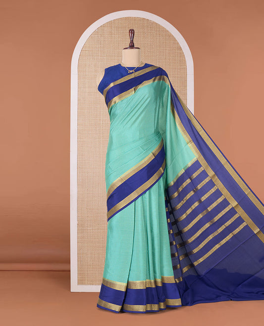 Green zari checked Mysore silk saree, contrast rettai pettu peacock eye zari border, and pallu of zari stripes