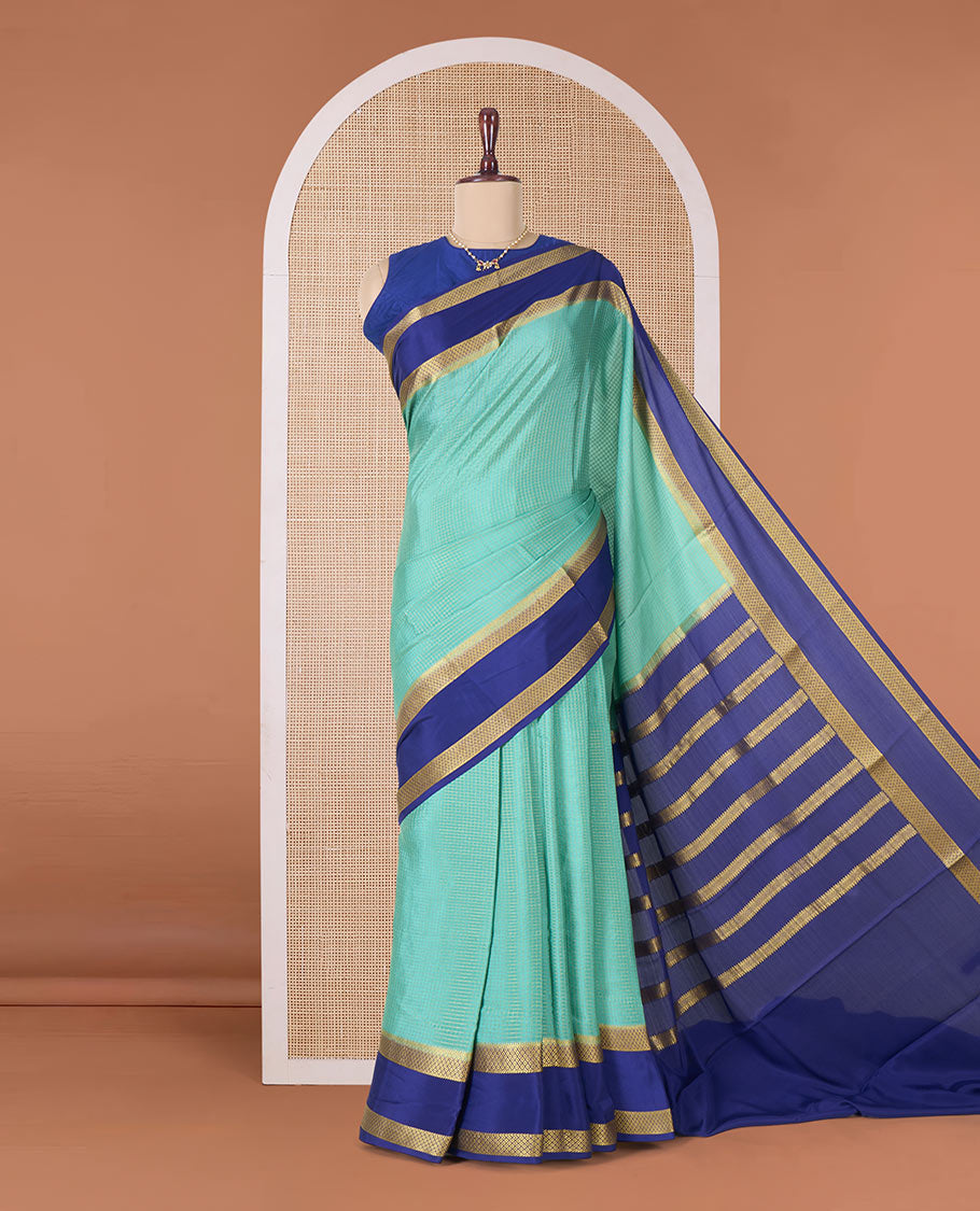 Green zari checked Mysore silk saree, contrast rettai pettu peacock eye zari border, and pallu of zari stripes