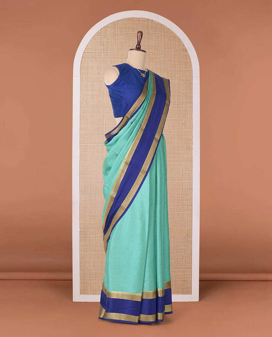 Green zari checked Mysore silk saree, contrast rettai pettu peacock eye zari border, and pallu of zari stripes