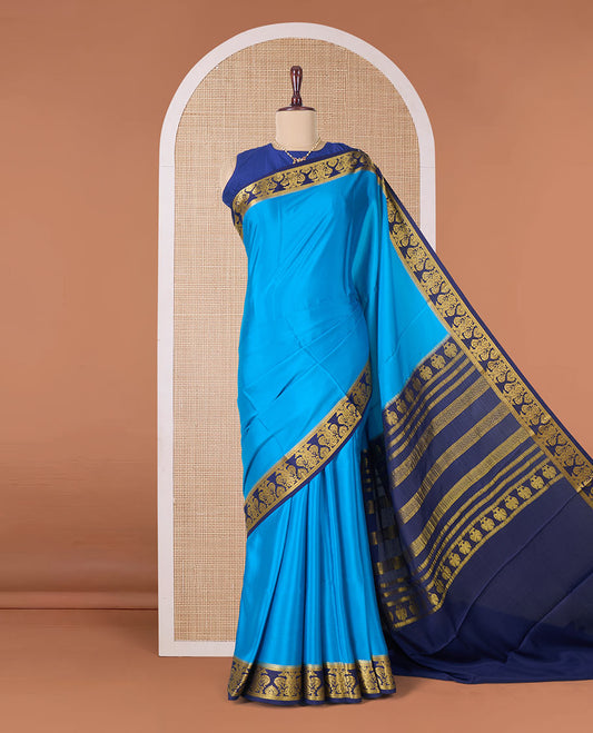 Blue plain Mysore silk saree, contrast two-headed eagle border, and pallu of traditional designs