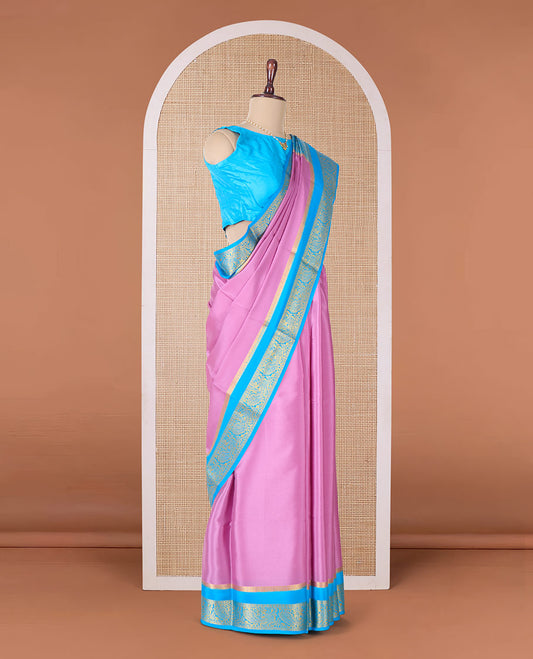 Purple plain Mysore silk saree, contrast rettai pettu peacock motifs zari border, and pallu of jaal design