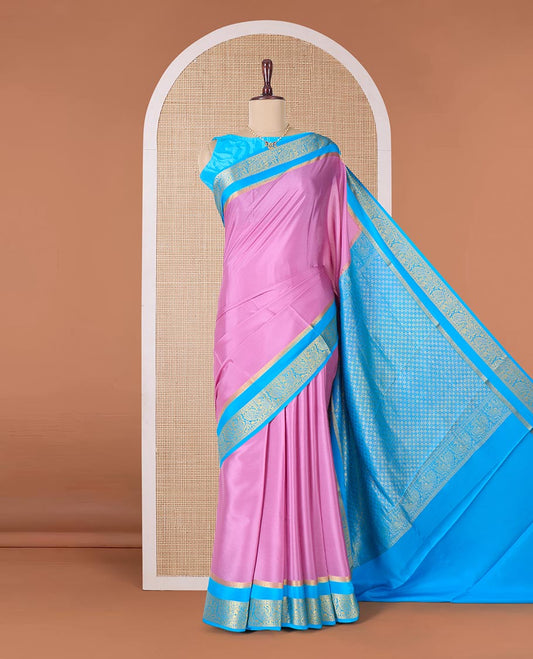Purple plain Mysore silk saree, contrast rettai pettu peacock motifs zari border, and pallu of jaal design