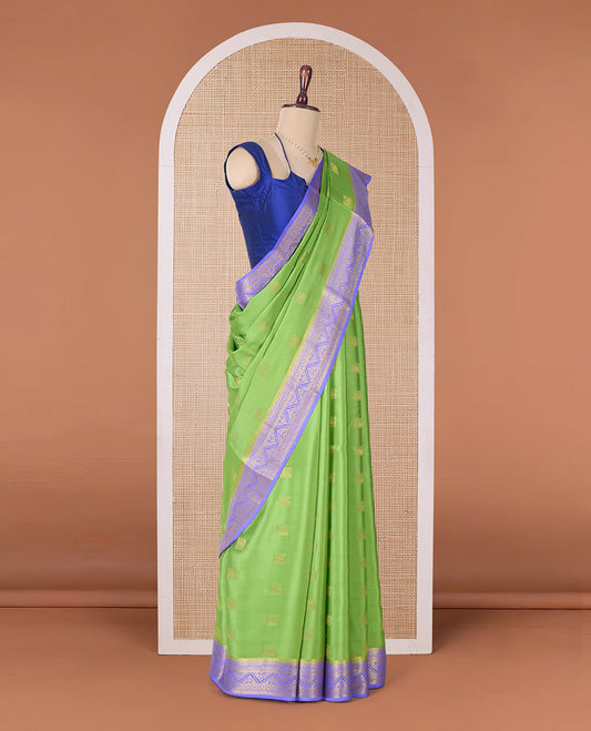Green zari buttas Mysore silk saree, contrast traditional zari border, and traditional zari designs woven pallu