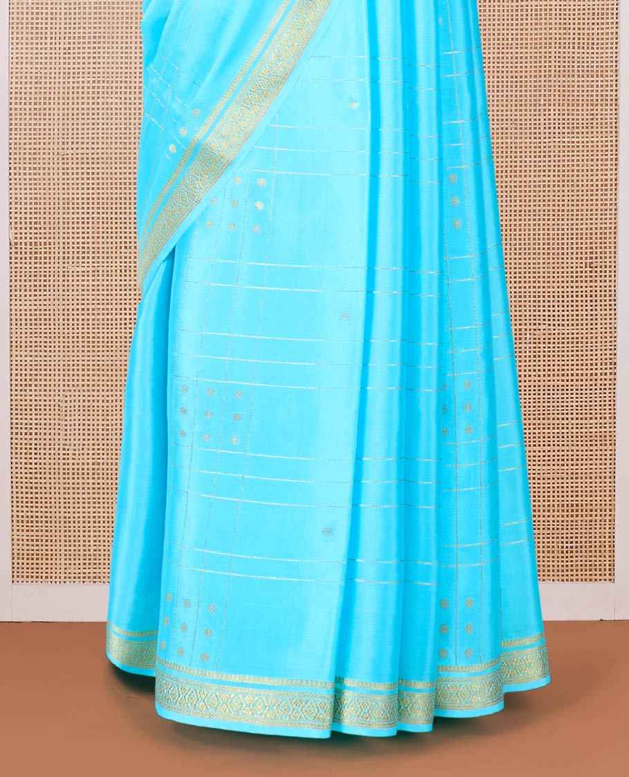 Blue buttas and checked Mysore silk saree, traditional zari border, and zari striped pallu