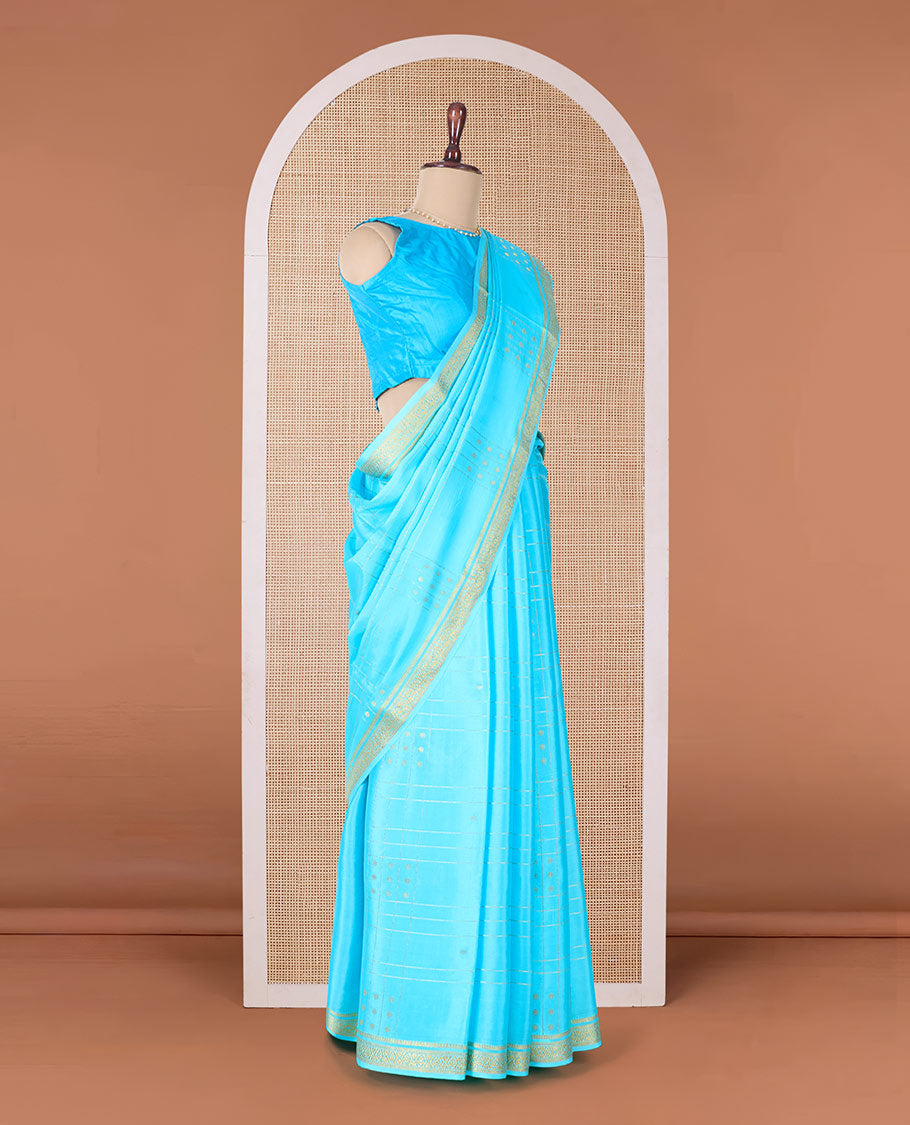 Blue buttas and checked Mysore silk saree, traditional zari border, and zari striped pallu