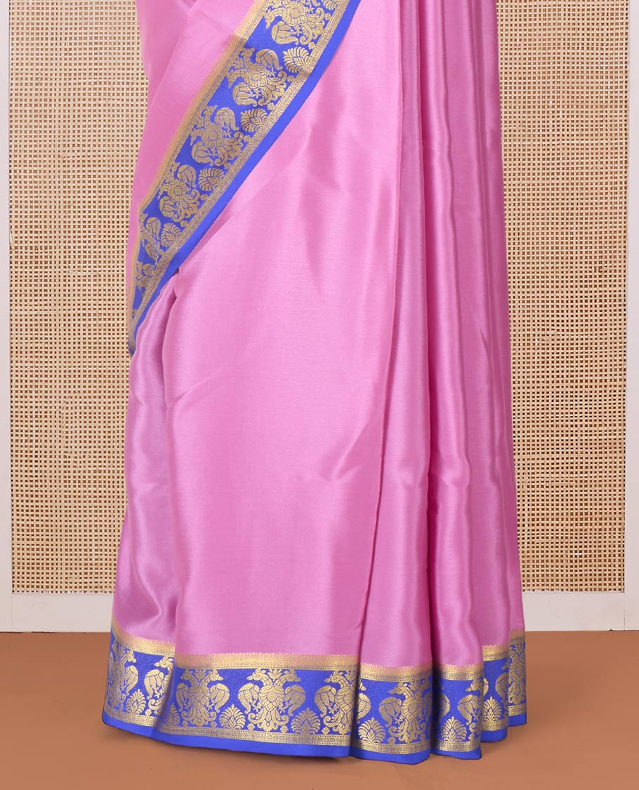 Purple plain Mysore silk saree, contrast two-headed eagle border, and pallu of traditional designs