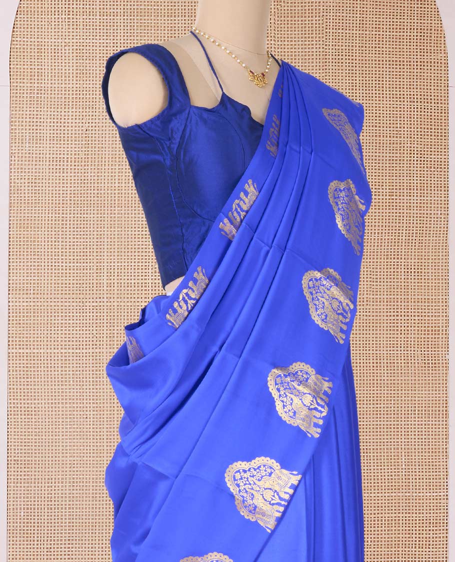 Blue plain Mysore silk saree, elephant motifs woven border, and pallu steeped with elephant motifs