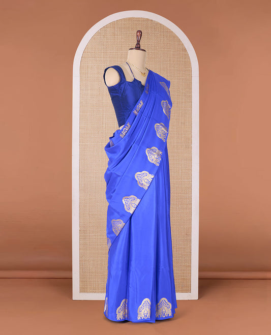 Blue plain Mysore silk saree, elephant motifs woven border, and pallu steeped with elephant motifs