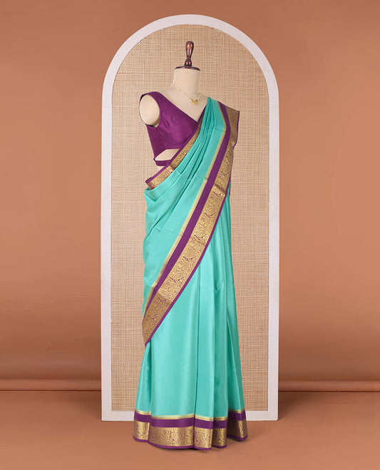 Green plain Mysore silk saree, contrast traditional zari rettai pettu border, and pallu of jaal design