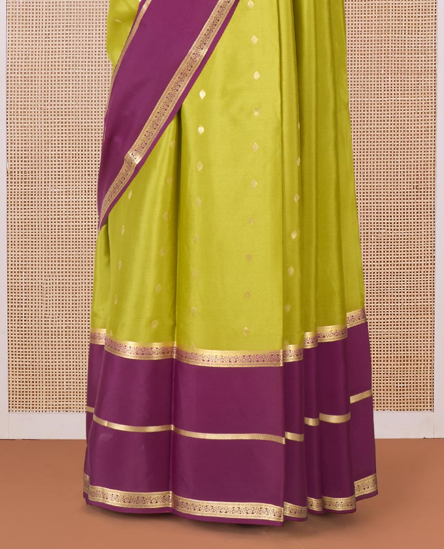 Green zari buttas Mysore silk saree, contrast traditional zari border, and pallu of Temple design in thick zari