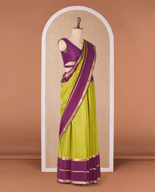 Green zari buttas Mysore silk saree, contrast traditional zari border, and pallu of Temple design in thick zari