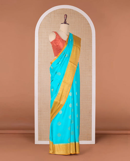 Blue zari buttas Mysore silk saree, contrast traditional zari border of floral creeper designs, and intricately woven pallu