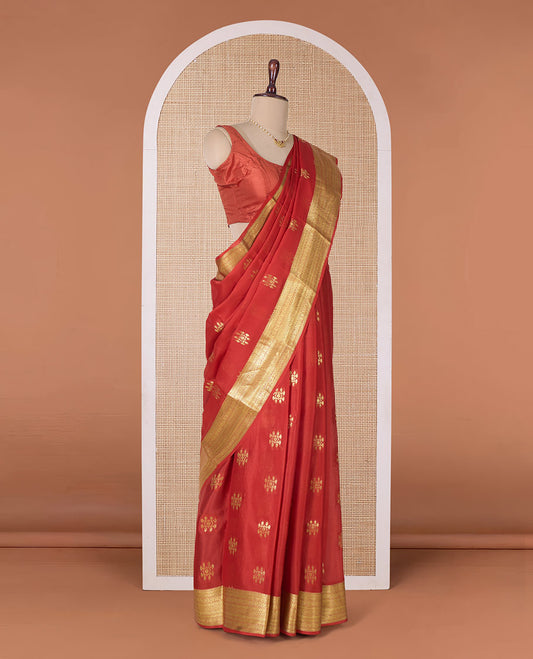 Orange zari buttas Mysore silk saree, traditional zari border, and pallu of jaal design