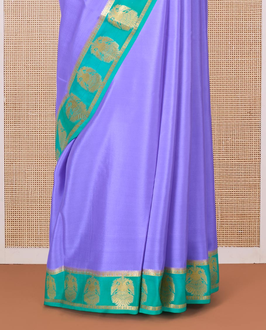 Lavender plain Mysore silk saree, contrast two-headed eagle border, and pallu of traditional designs