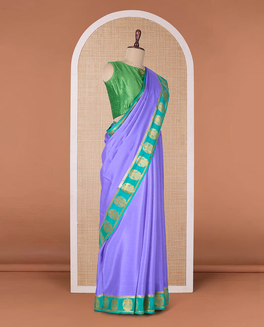 Lavender plain Mysore silk saree, contrast two-headed eagle border, and pallu of traditional designs